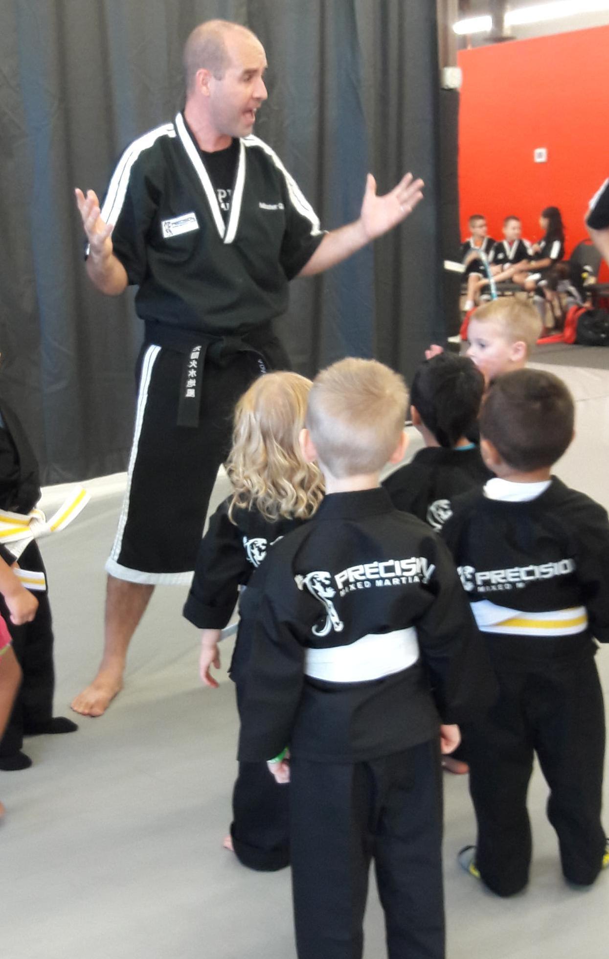 Child learning martial arts at Precision Martial Arts